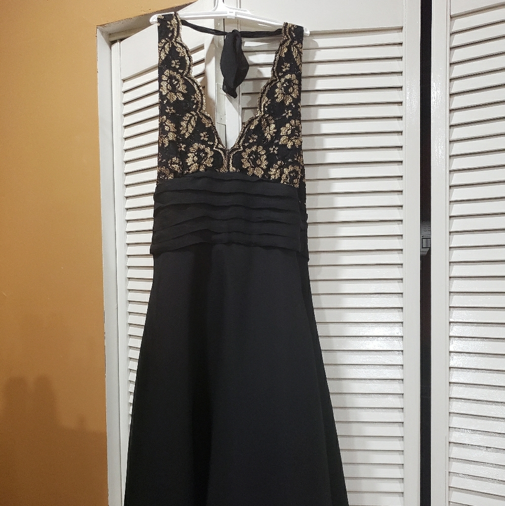 Black Dress with Gold Accents